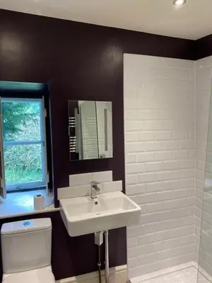 a bathroom with a sink and a toilet at 4 bedroom farmhouse Brecon Beacons in Talgarth