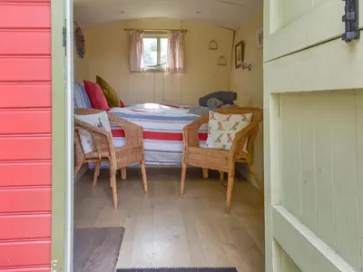 a dining room with a table and chairs in a room at Tilly - Uk49798 in Brecon