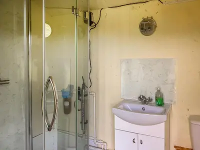 a bathroom with a shower and a sink at Sweet Briar - Uk49797 in Brecon