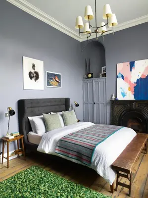 a bedroom with a bed and a fireplace at The Royston in Llanbrynmair