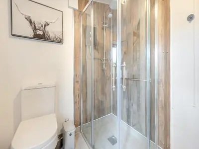 a bathroom with a shower and a toilet at Shire - Uk49791 in Cribyn