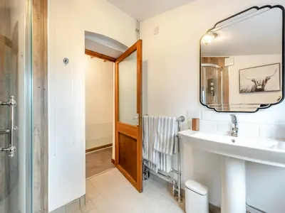 a bathroom with a sink and a mirror at Shire - Uk49791 in Cribyn