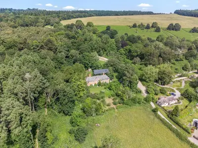 an aerial view of a house in the forest at Croft Lodge Studio in Leominster