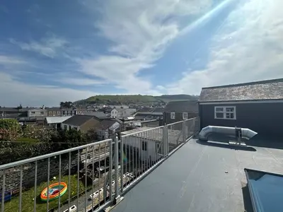 a balcony with a view of a city at Mermaids Hideaway in Aberaeron