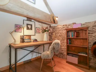 a room with a desk and a chair at The Art House in Leominster