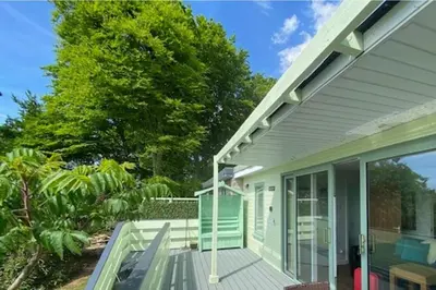 a porch of a house with a deck at Snowdonia 1-Bed Chalet Sleeps 2 Stunning Views in Pennal