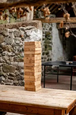 a stack of wooden blocks on a wooden table at Ty Neuadd in Dolgellau