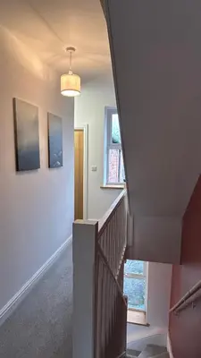 a staircase in a home with a stair case at Builth wells stay in Builth Wells