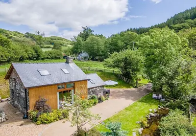 an overhead view of a house with solar panels on the roof at Y Pandy in Pennal