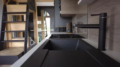 a kitchen with a sink and a stove at Daverneithon 1 in Rhayader