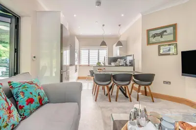 a living room with a couch and a table at 2 Bed in Llanybydder oc-b32255 in Cwrt-newydd