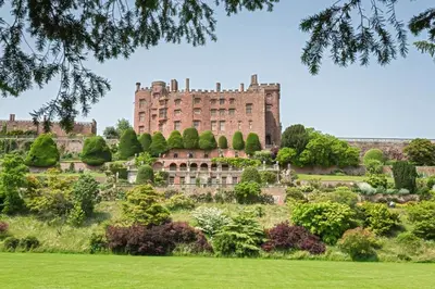 a large castle on a hill with a garden at 2 Bed in Carreghofa oc-t32530 in Llanymynech