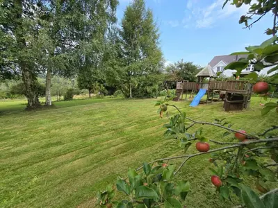 a park with a playground and a picnic table at Modern Retreat near Aberaeron - Luxe 1 bed Escape in Ciliau-Aeron