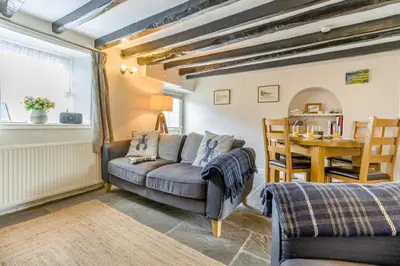 a living room with a couch and a table at 2 Bed in Llanon oc-e32781 in Llanon