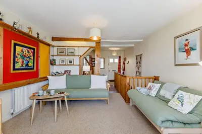 a living room with a couch and a table at 2 Bed in Brecon oc-t32728 in Brecon