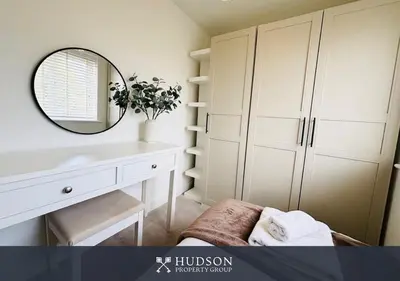 a bathroom with a mirror and a sink and a vanity at 3 Bed Stylish Shrewsbury Home in Shrewsbury