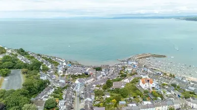 an aerial view of a city next to the water at Mermaid's Apartment by Ty Annie Holidays in New Quay