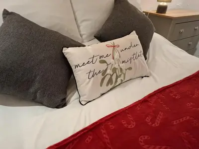 a bed with a pillow with the words next to it at 1 Bed in Capel Bangor oc-y33024 in Capel Bangor