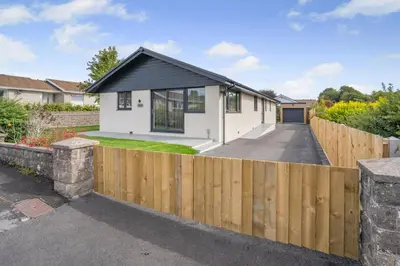 a wooden fence in front of a house at 4 Bed in Brecon oc-m32973 in Brecon