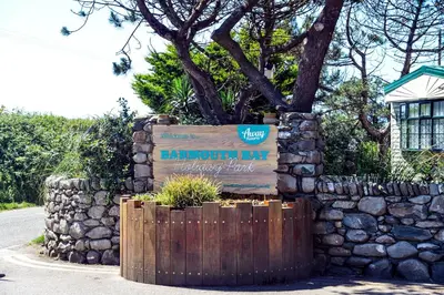 a sign for a hawaiian key vacation house at Barmouth Bay Holiday Park in Barmouth
