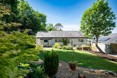 a house with a garden in front of it at Mehefin in Harlech