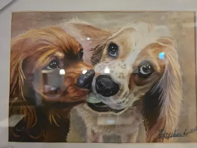 a painting of two dogs looking at the camera at Twin room - The Unicorn Hotel in Llanidloes