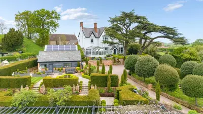an image of a house with a garden at The Topiary by Birch Stays in Wollaston