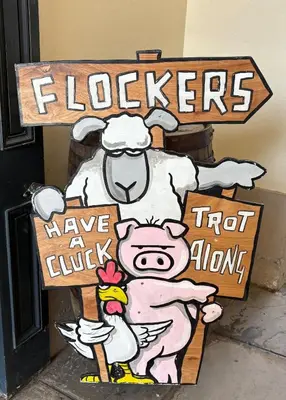 a sign with a pig and a cow on it at Charming 2 bedroom cottage in Brecon - families and pets welcome! in Brecon
