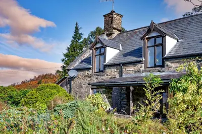 an old stone house with a slate roof at Finest Retreats - Waen Fechan in Dolgellau