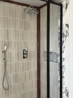 a shower with a glass door in a bathroom at Luxury Apartment in Shropshire sleeps 4 in Shrewsbury