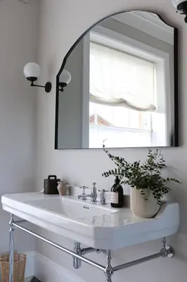 a bathroom with a white sink and a mirror at Luxury Apartment in Shropshire sleeps 6 in Shrewsbury