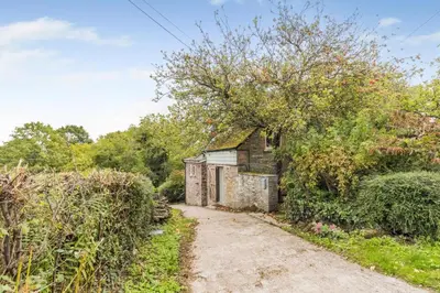 an old stone cottage on a dirt road at 3 Bed in Newton St. Margarets oc-o33367 in Saint Margaret