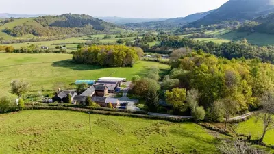 an aerial view of a house in a field at Penrhyllan