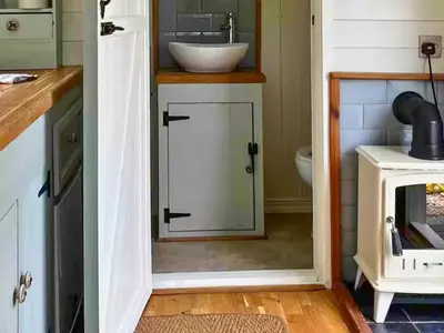 a bathroom with a sink and a counter with a sink at Bryn Gwyn - Ukc7801 in Shrewsbury