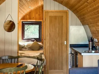 a small room with a bed and a table and a kitchen at The Orchard - Ukc7804 in Shrewsbury
