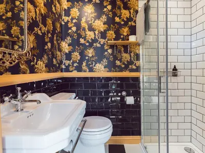 a bathroom with a sink and a toilet at Belmont House in Hay-on-Wye