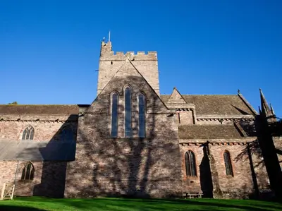 a large brick church with a tower on top at 3 Bed in Brecon oc-92341 in Brecon