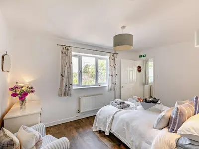 a bedroom with two beds and a window at 1 Bed in Leominster oc-78638 in Stoke Prior