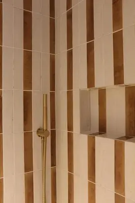 a shower with a shelf and a shower hose at Spacious Luxury Apartment in the Heart of Shrewsbury Sleeps 6 in Shrewsbury