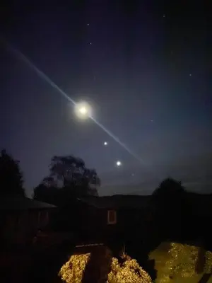 a light streak in the sky at night at Log Cabin in Beautiful Snowdonia in Trawsfynydd