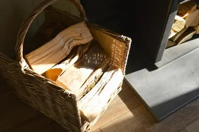 a wicker basket sitting on top of a wooden floor at Lavender Lodge