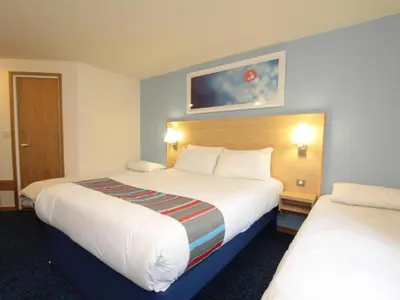 a hotel room with two beds in a room at Travelodge Ludlow in Ludlow