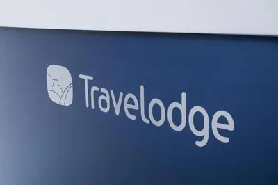 a sign with the words travel lookedage on it at Travelodge Shrewsbury Bayston Hill in Meole Brace