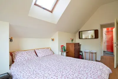 a bedroom with a bed and a window at Finest Retreats - Canal Central in Ball