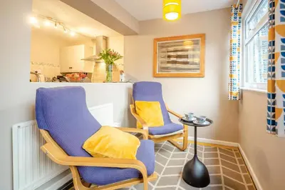 two chairs and a table in a room at 2 Bed in Trawsfynydd oc-t34148 in Trawsfynydd