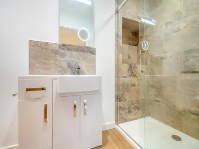 a bathroom with a sink and a shower at Arenig View - Uk51068 in Frongoch