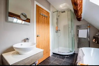 a bathroom with a sink and a shower at 5 bedroom Barn, Ludlow in Caynham
