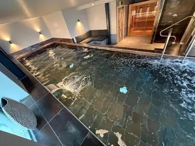 a large pool of water in a bathroom with at 3 Bed Spacious Luxury Duplex - Shrewsbury Town Centre in Shrewsbury