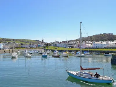 a group of boats docked in a harbor at Awel Y Mynydd - Mountain Breeze in Strata Florida