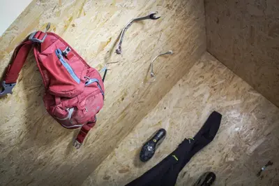 a person with a backpack and hiking gear on a floor at Mid Wales Holiday Lets, Rhayader in Rhayader